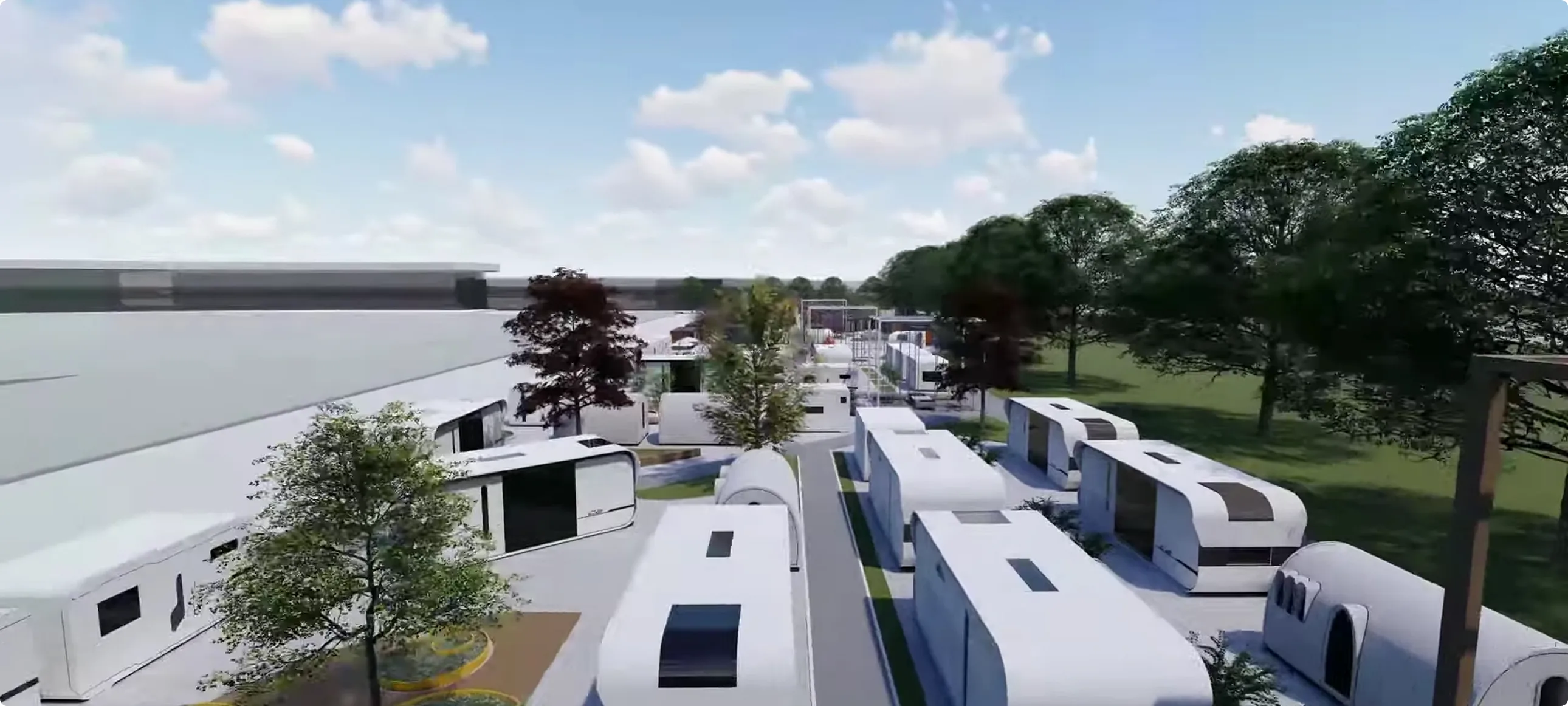 Aerial view of multiple modular home units arranged in an outdoor display or production area