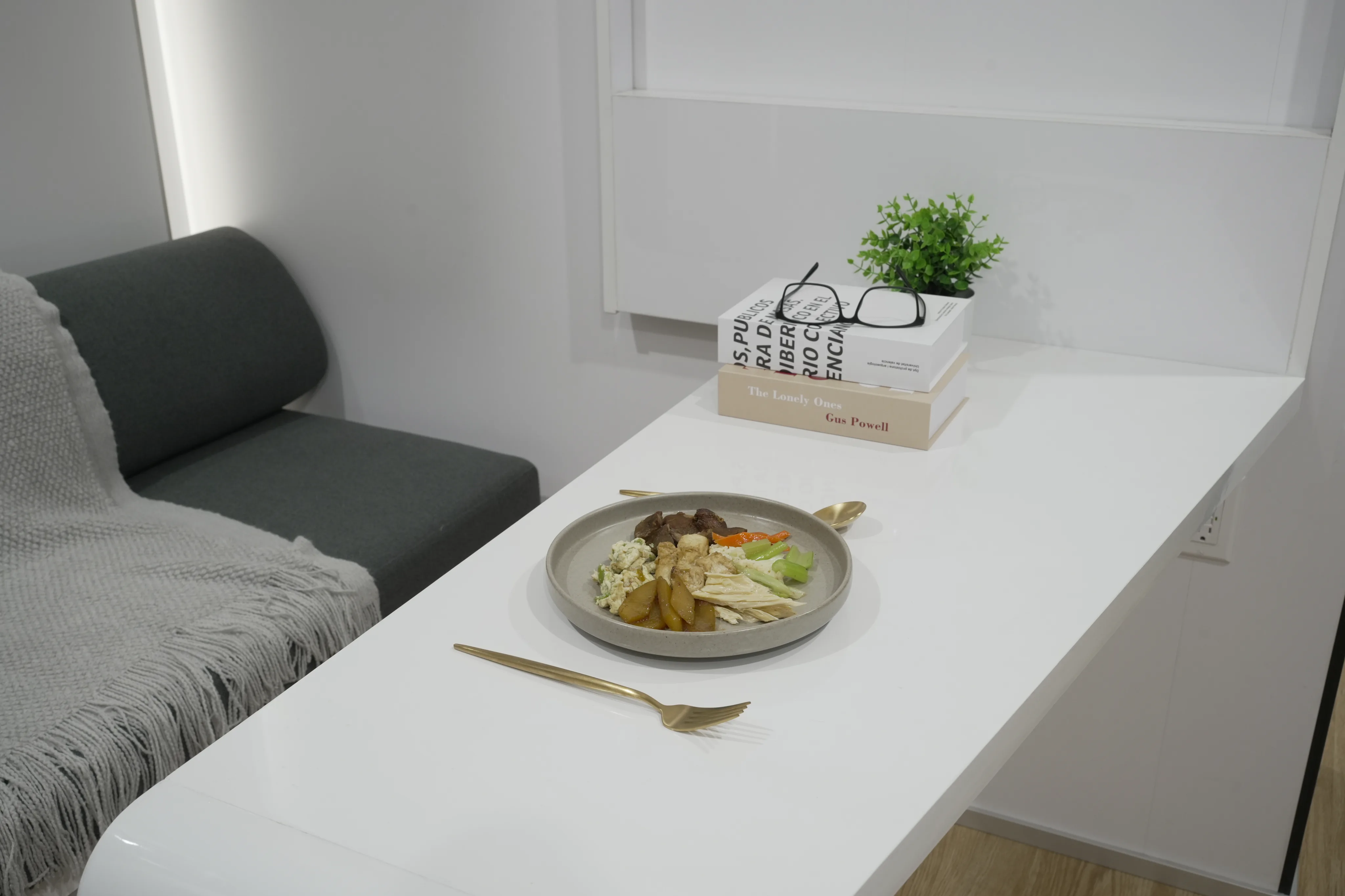 Nestron modular home bedside table with plate of food, joy feature