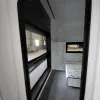 Nestron Cube Two X interior hallway with window view
