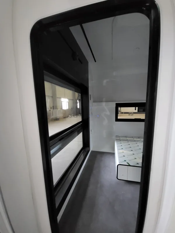 Nestron Cube Two X interior hallway with window view