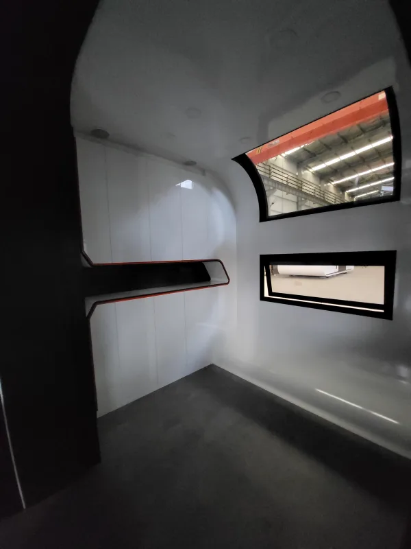 Nestron Cube Two X interior with windows and overhead lighting