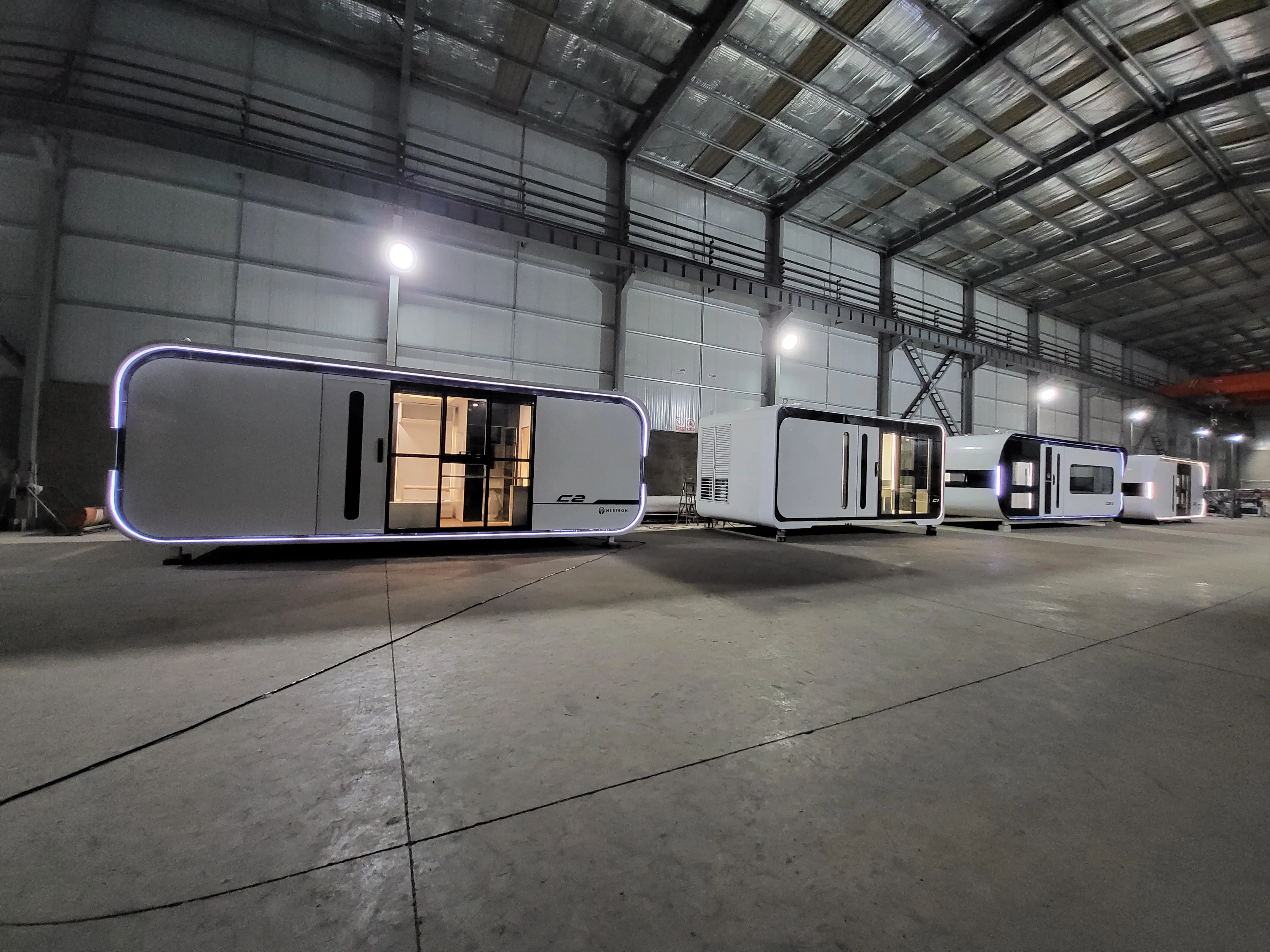 Nestron modular home units lined up inside factory warehouse, joy feature