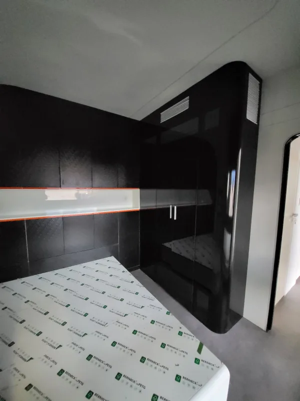 Nestron Cube Two X interior with angled black ceiling detail