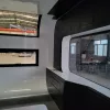 Nestron Cube Two X interior with window and dark cabinetry
