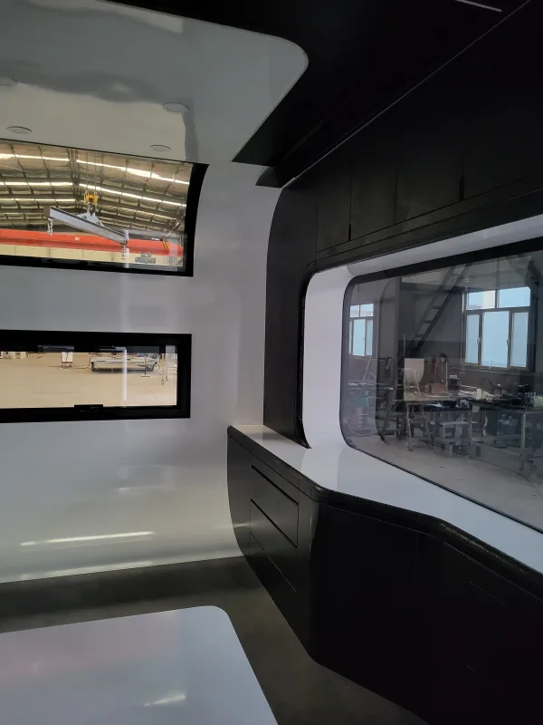 Nestron Cube Two X interior with window and dark cabinetry