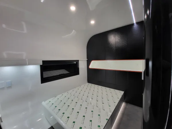 Nestron Cube Two X interior with angled black ceiling detail