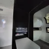 Nestron Cube Two X interior hallway with dark paneling