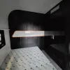 Nestron Cube Two X interior with angled black ceiling detail