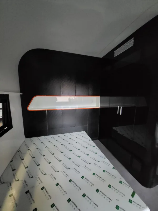 Nestron Cube Two X interior with angled black ceiling detail