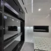 Nestron Cube Two X interior hallway with dark paneling