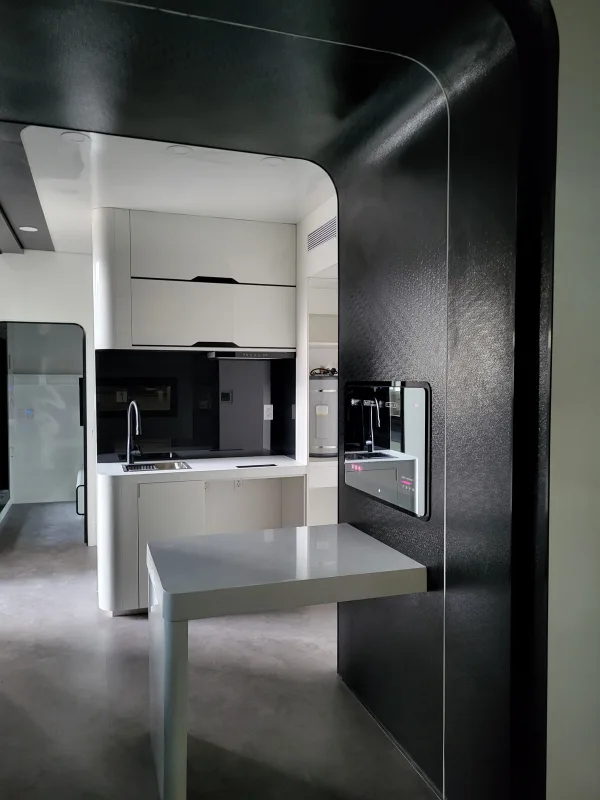 Nestron Cube Two X kitchen interior with dark cabinetry