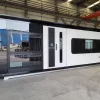 Front exterior rendering of the Nestron Cube Two X at a factory with a white entry door and large dark tinted windows
