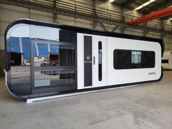 Front exterior rendering of the Nestron Cube Two X at a factory with a white entry door and large dark tinted windows