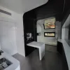 Nestron Cube Two X kitchen rendering with dark cabinetry, a sink, and built-in appliances