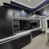 Nestron Cube Two X kitchen rendering with dark cabinetry, built-in appliances, and under-cabinet lighting