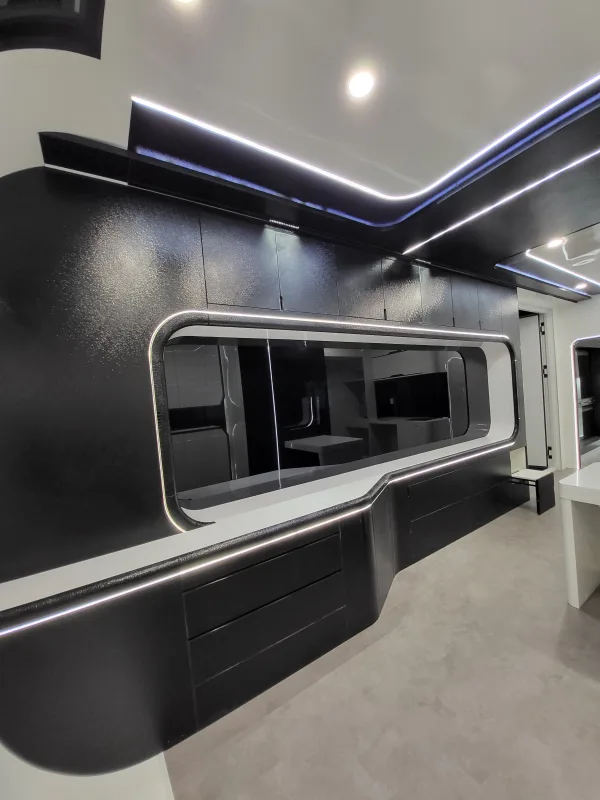 Nestron Cube Two X kitchen rendering with dark cabinetry, built-in appliances, and under-cabinet lighting