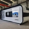 Front exterior rendering of the Nestron Cube Two X with a large reflective window and dark trim