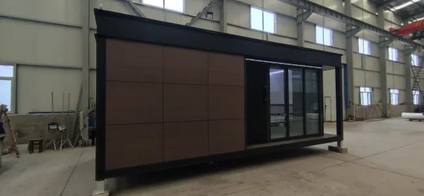 Side exterior rendering of the Nestron Legend One with brown facade panels, dark trim, and a large glass door