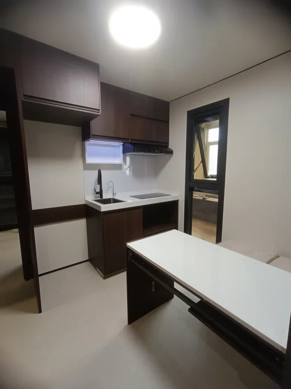 Nestron Legend Two dining area rendering with a white table, dark seating, and built-in wood cabinetry