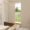 Nestron Legend Two X interior rendering showing a bright room with a large window, light wood flooring, and neutral walls