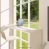 Nestron Legend Two X interior rendering with large floor-to-ceiling windows, a compact table, and greenery outside