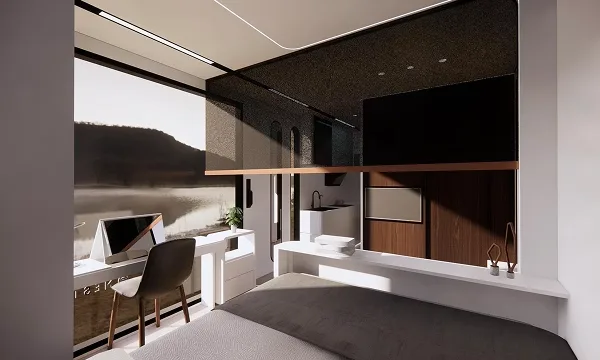 Nestron modular home interior with a compact kitchen, dining area, built-in cabinetry, and large windows