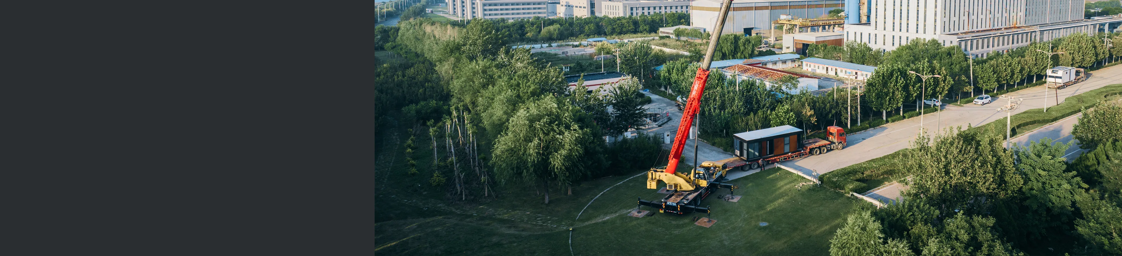 Aerial view of a wooded site with construction or installation activity