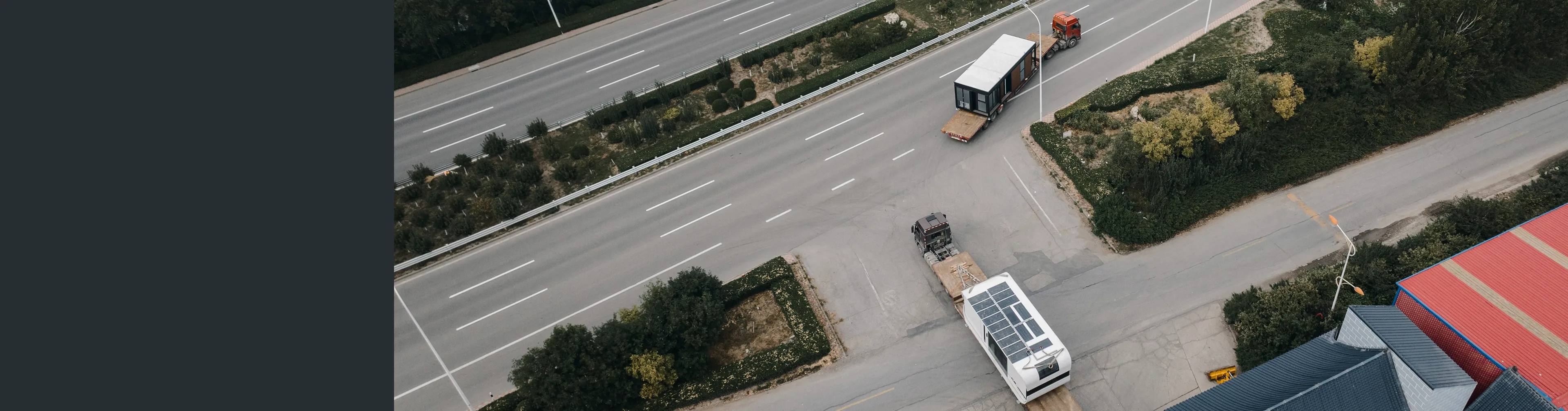 Aerial view of vehicles traveling along a divided roadway
